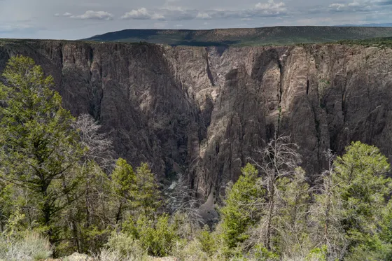 Looking down the sheer depth of the Black Canyon to the river