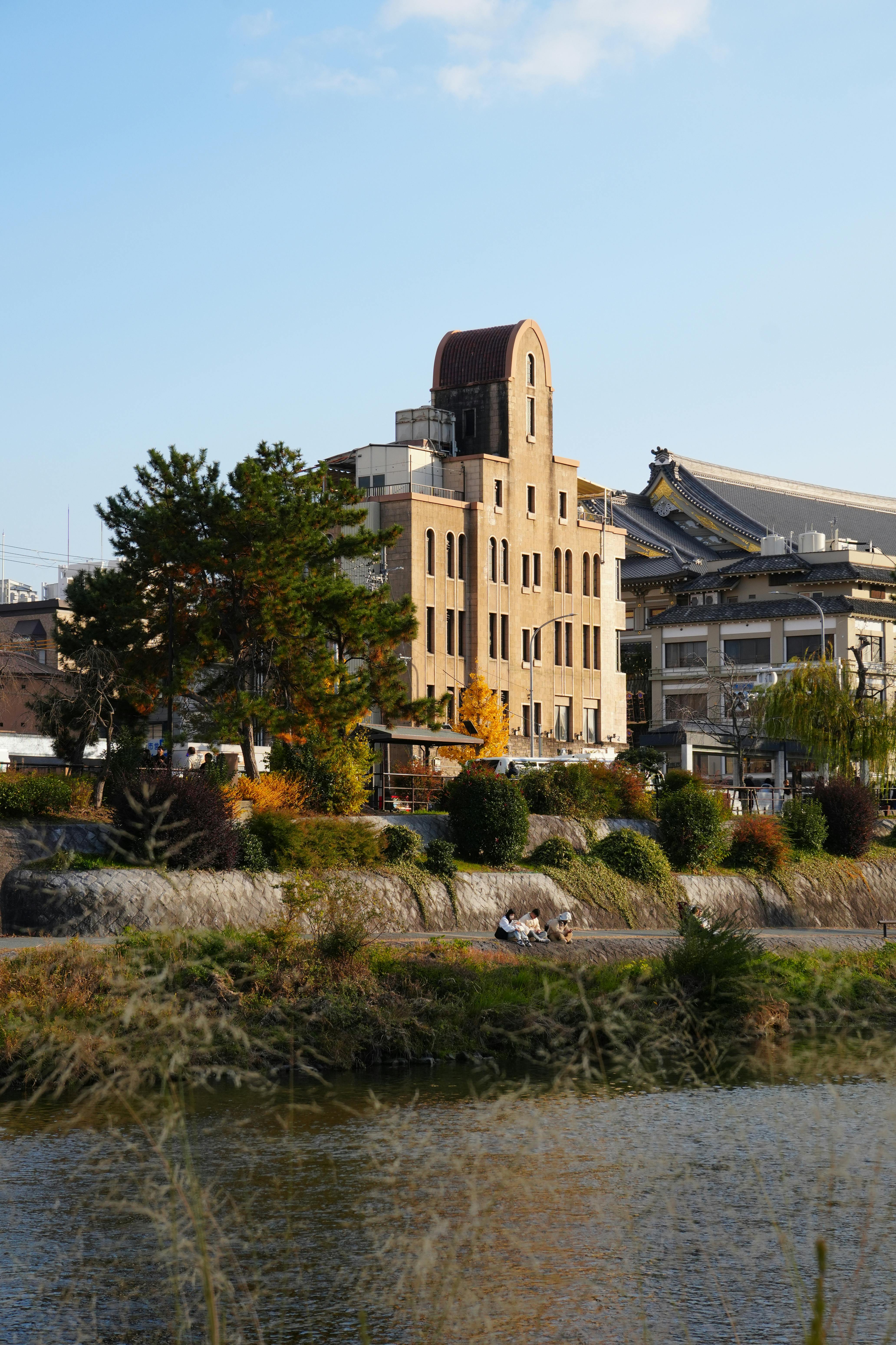 Autumn Riverside View with Historic Architecture