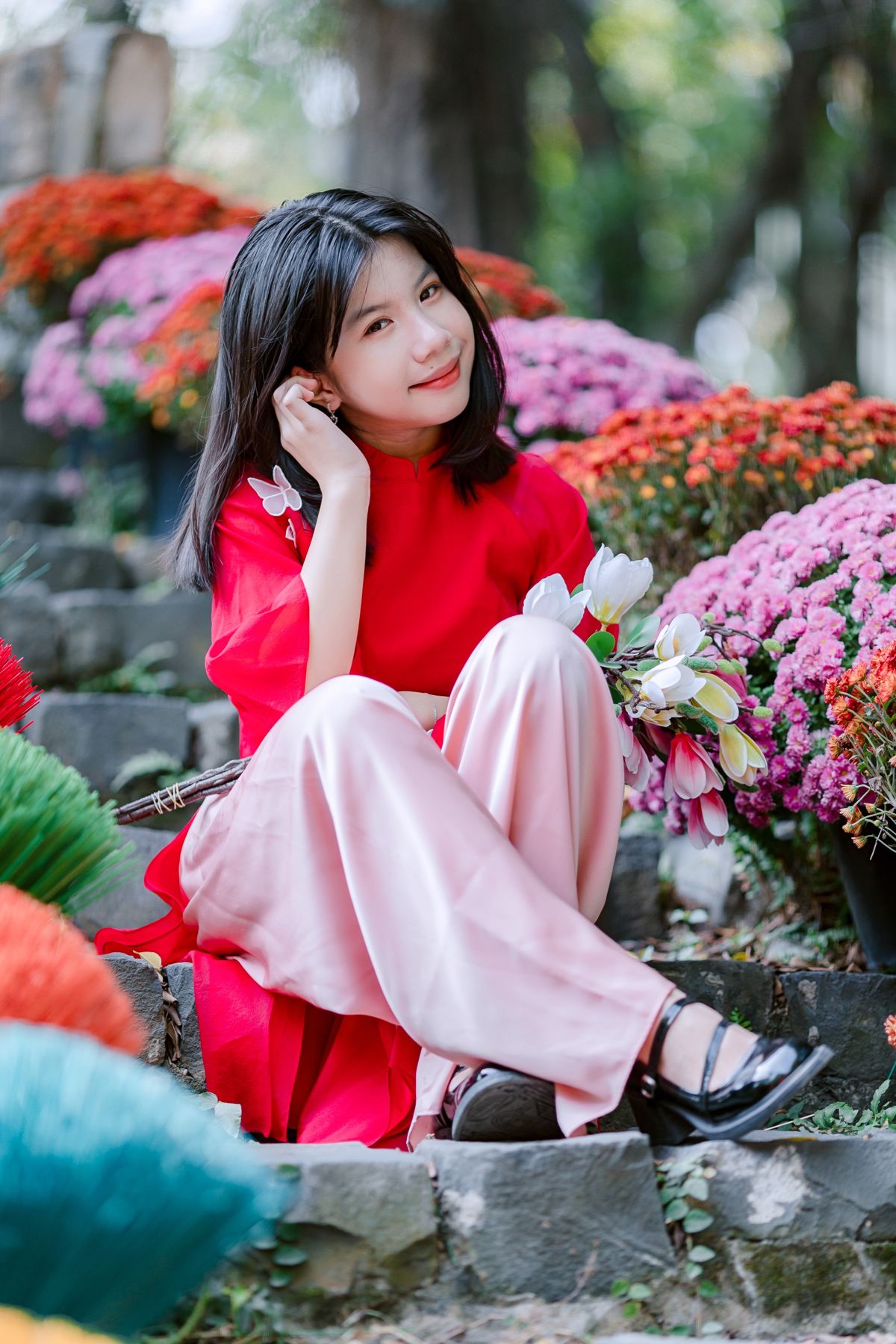 Smiling Girl in Traditional Dress with Flowers · Free Stock Photo