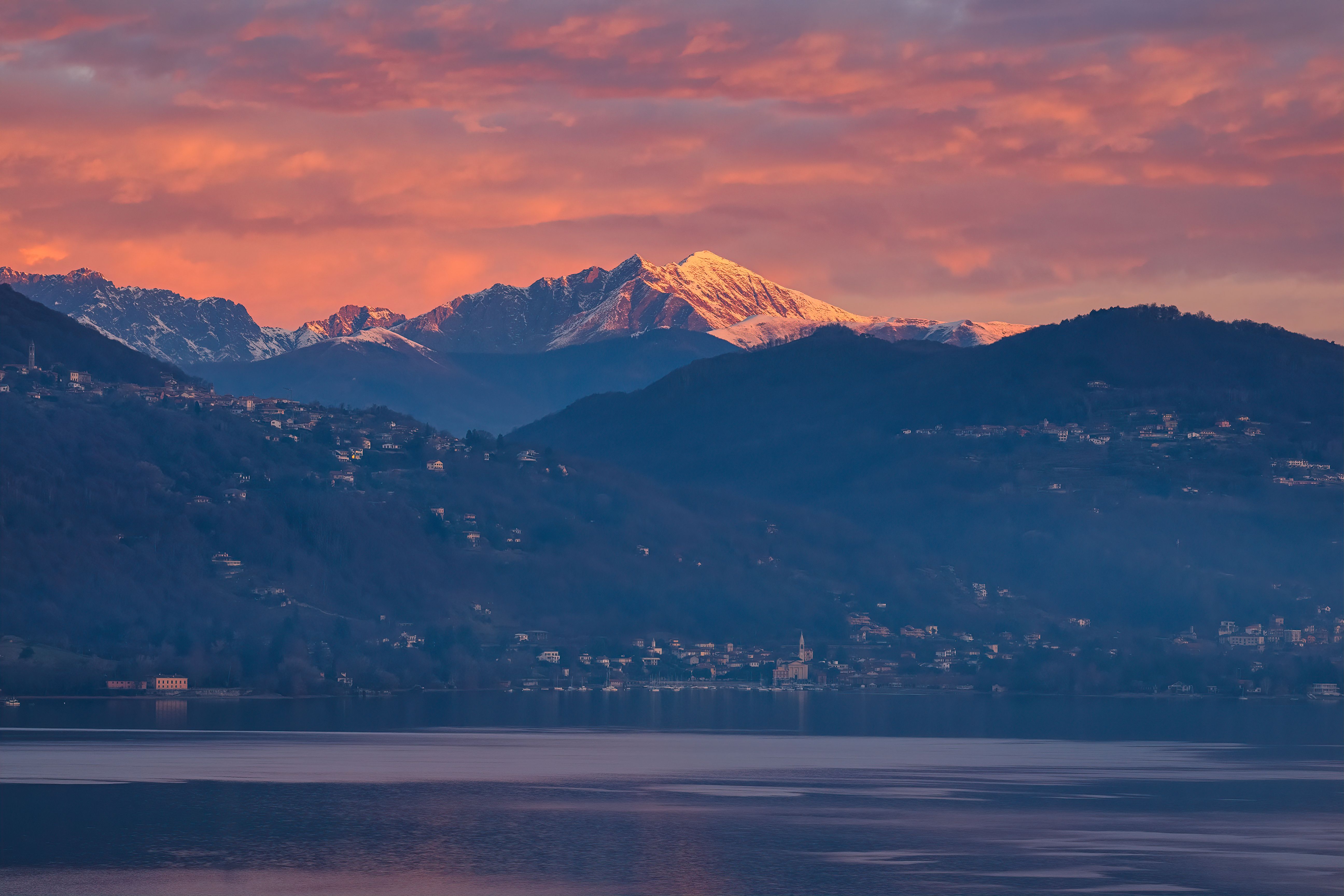 Serene Twilight Over Lake and Snowy Mountains · Free Stock Photo