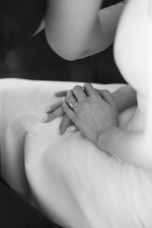 Free Close-up of hands holding, highlighting an engagement ring in a soft, romantic setting. Stock Photo