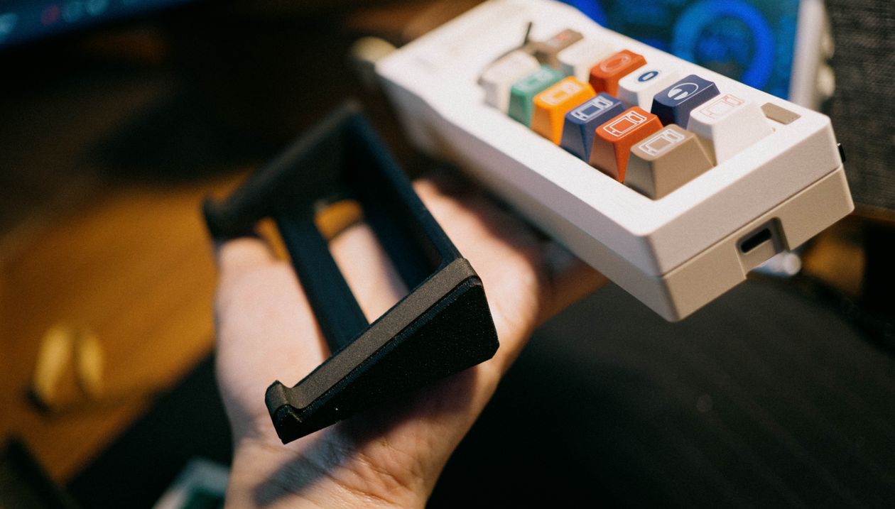 Handheld Controller Keypad Close-up of Mechanical Keypad in Hand · Free Stock Photo