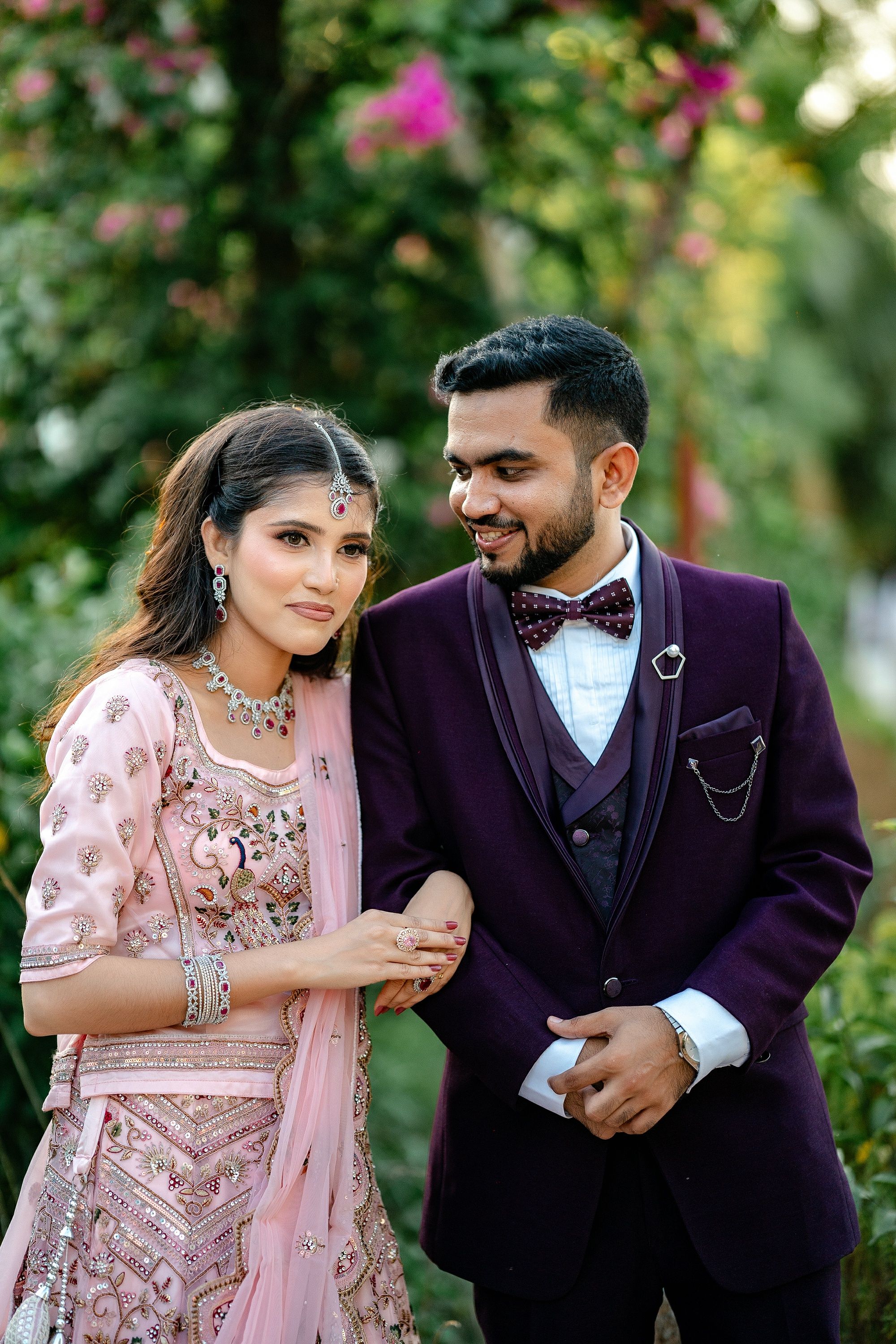 Elegant Couple in Traditional Attire Outdoors · Free Stock Photo