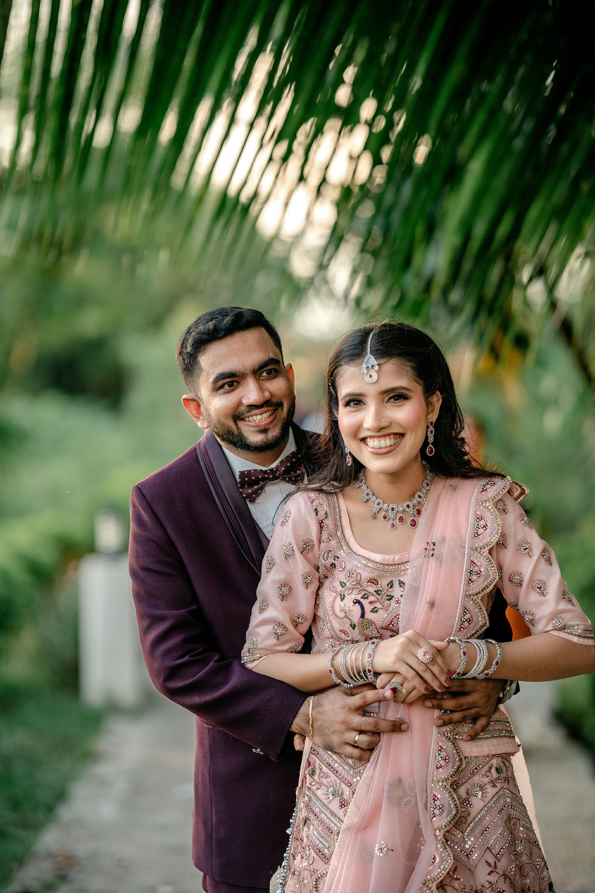 Smiling Couple in Traditional Wedding Attire Outdoors · Free Stock Photo