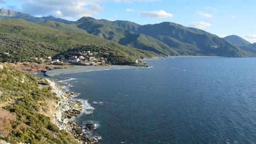 Free Aerial view of the picturesque coastline and hills of Ogliastro, Corse, France. Stock Photo