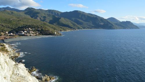 Free Breathtaking view of Ogliastro coastline in Corsica, with mountains and sea. Stock Photo