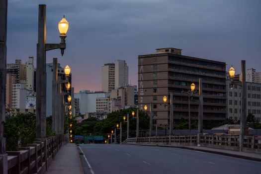 Evening view of city street and skyline in Belo Horizonte, Brazil.