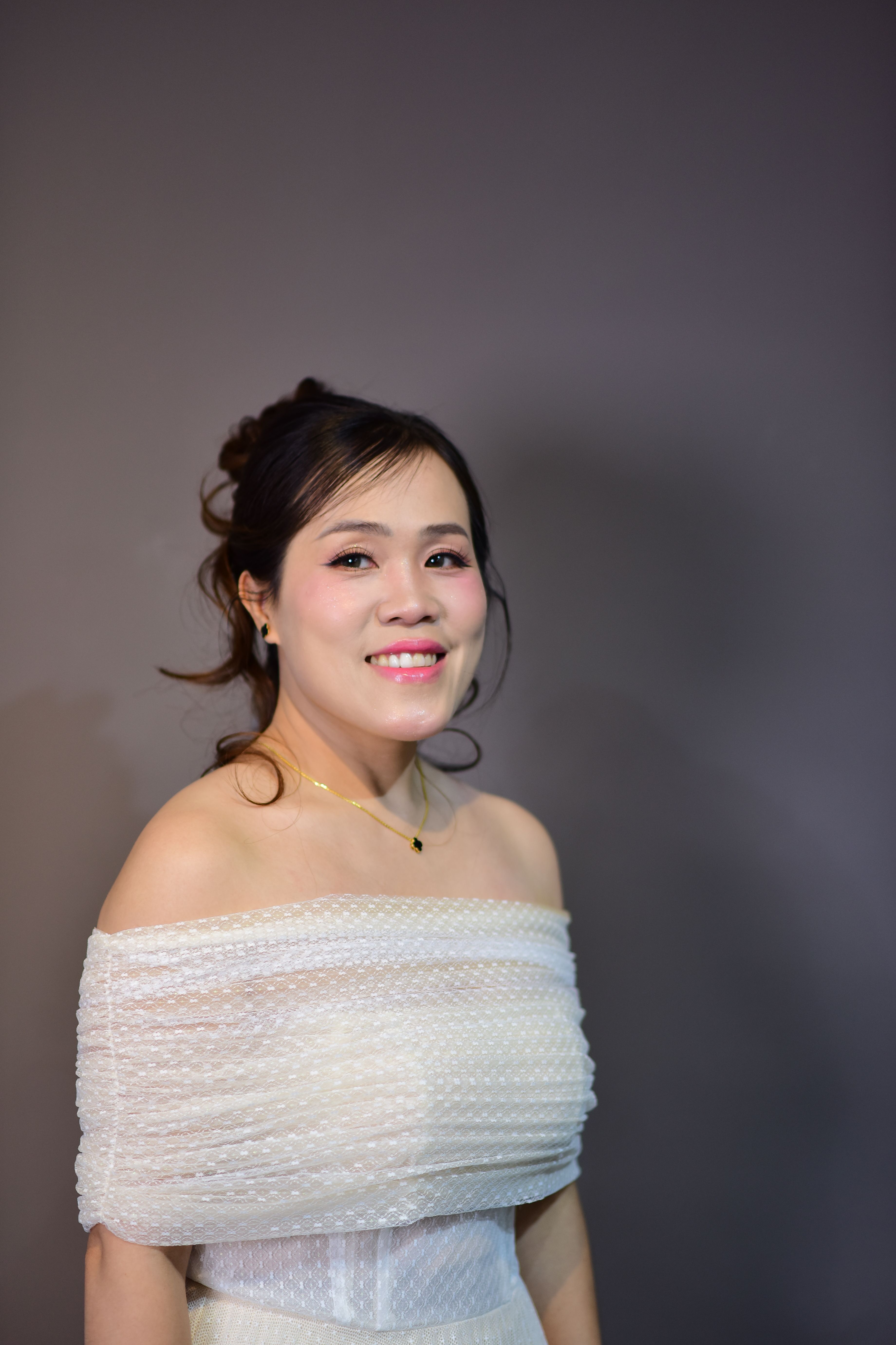 Elegant Woman in Off-Shoulder White Dress Portrait · Free Stock Photo