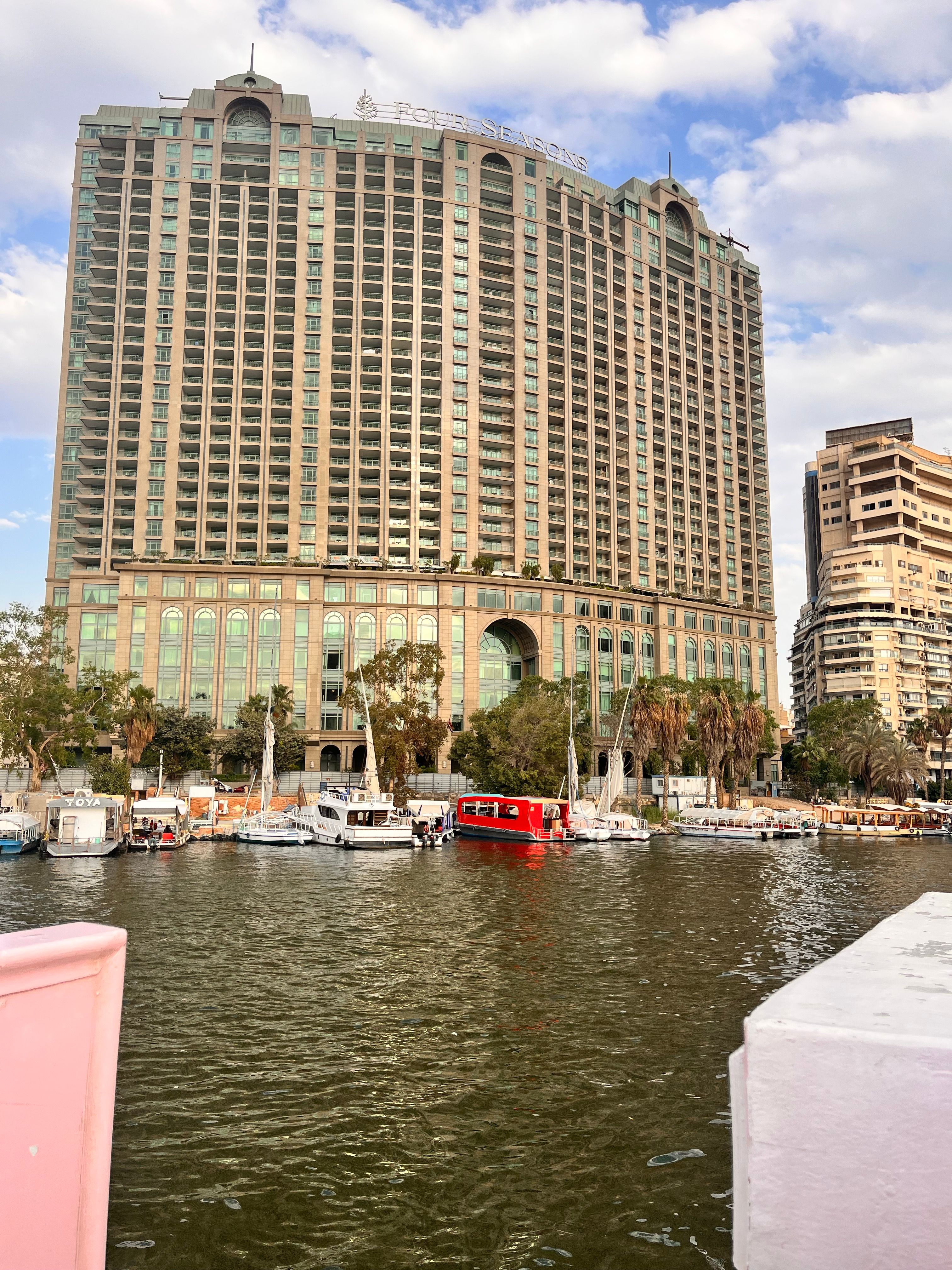 High-rise Building Overlooking Waterfront in Cairo · Free Stock Photo