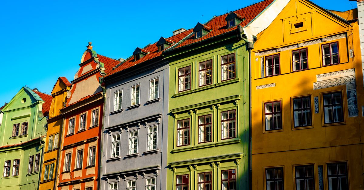 Vibrant and historic row of colorful buildings in Prague, showcasing classic European architecture.