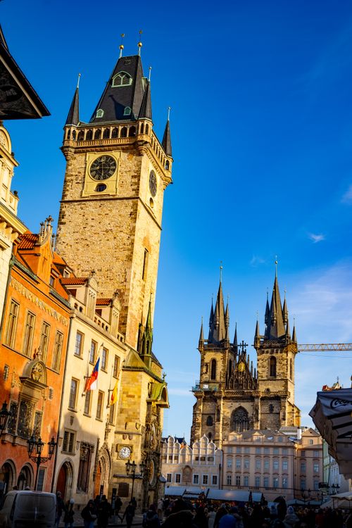 Free Stunning view of Prague's Old Town Square featuring the iconic Astronomical Clock and Gothic spires. Stock Photo