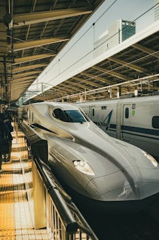 High-speed Shinkansen train at Tokyo Station in Chiyoda City, capturing modern Japan travel.