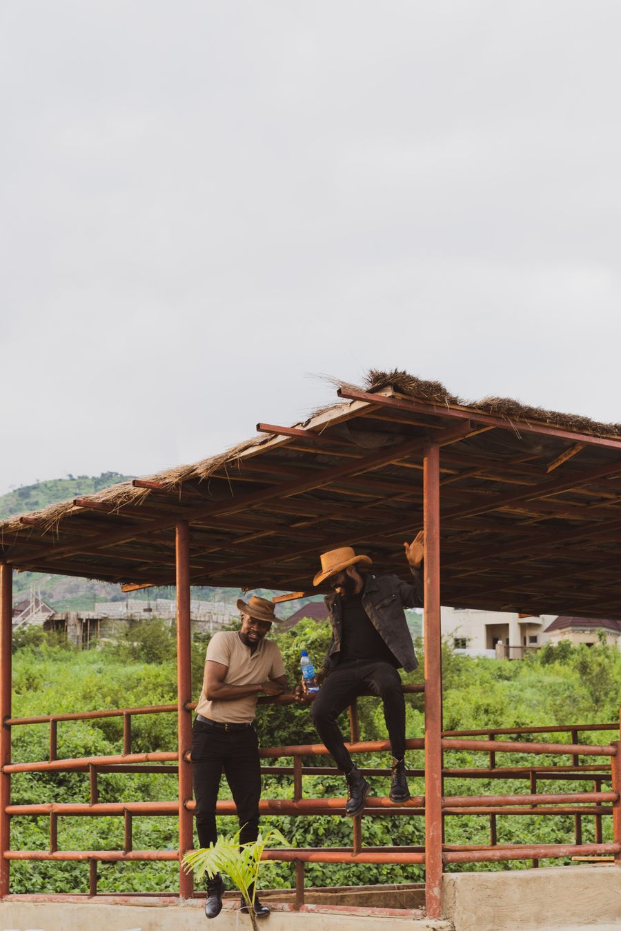 Cowboys at a ranch shade structure