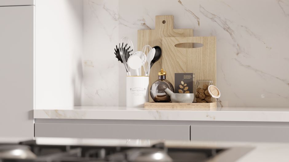 Affordable Cabinet Refinishing in Boulder County | Save vs. Replacement 2 Modern kitchen countertop with utensils and decor, showcasing minimalist style.