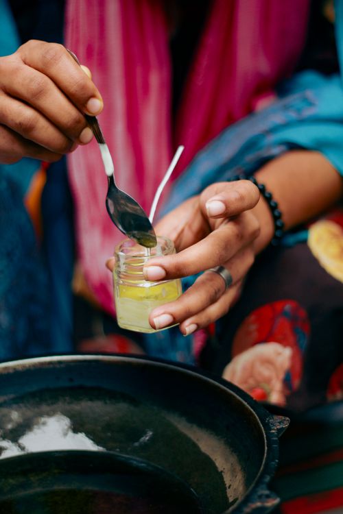 Free Close-up of hands creating eco-friendly candles during training in Dhaka, Bangladesh. Stock Photo