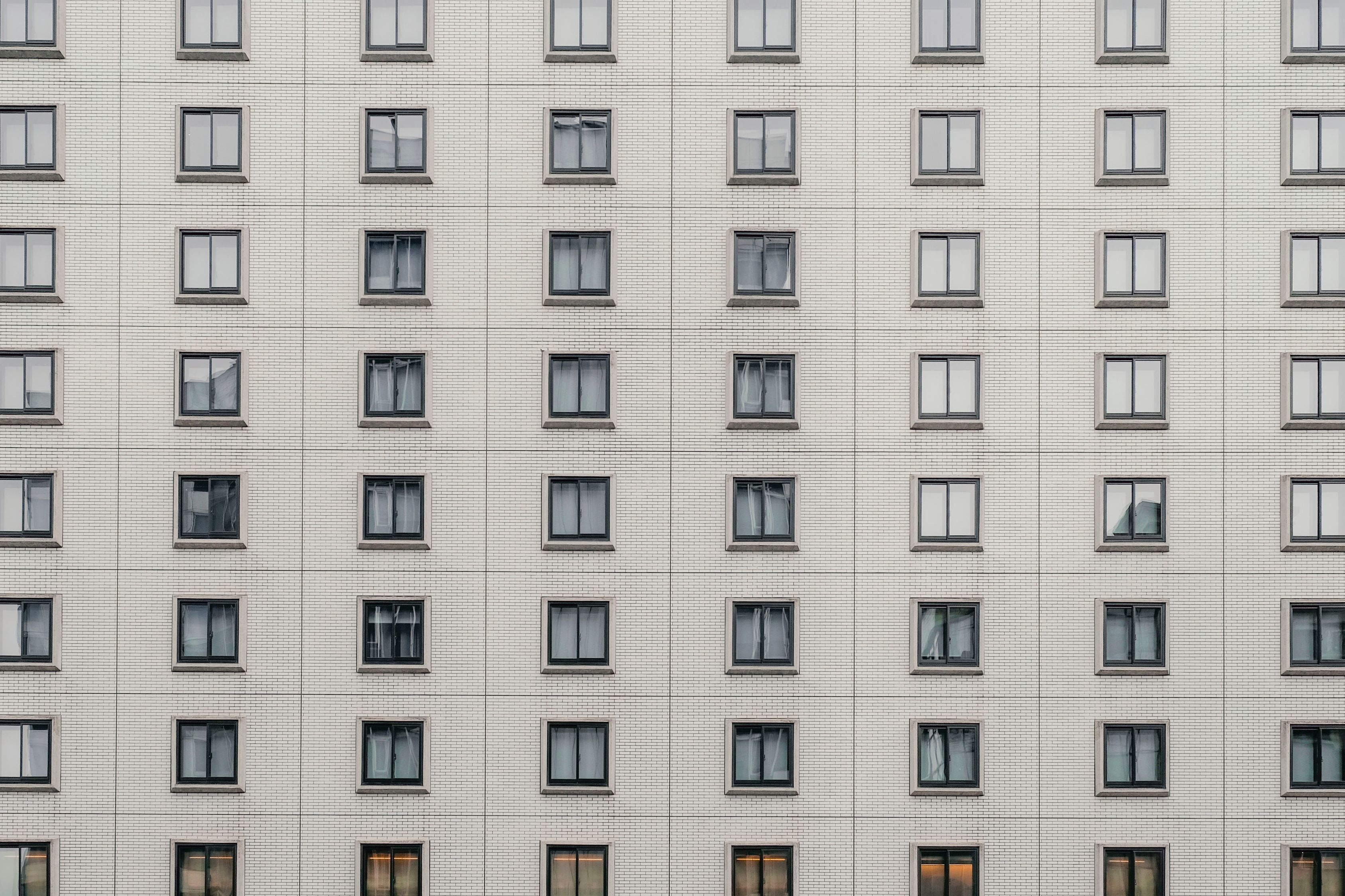 Grey Colorhi Rising Building Gray High-rise Building · Free Stock Photo