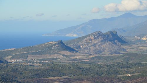 Free Breathtaking aerial view of the mountainous landscape and coast in Oletta, Corsica, France. Stock Photo