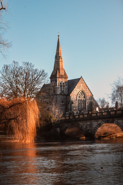 Free Stunning view of St. Mary's Church and bridge over River Severn in Shrewsbury, England. Stock Photo