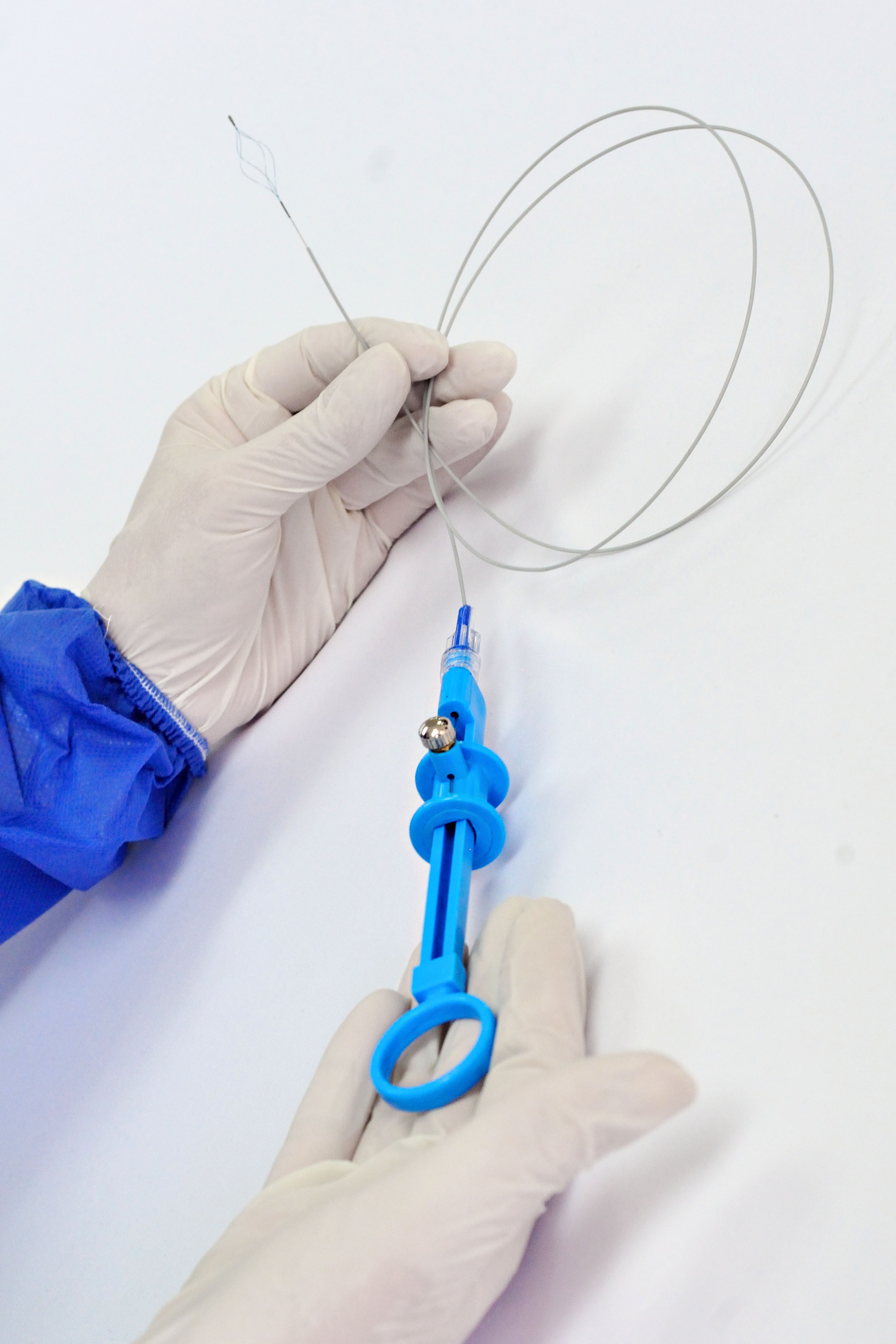 Surgeon's Hands with Medical Device and Wire · Free Stock Photo