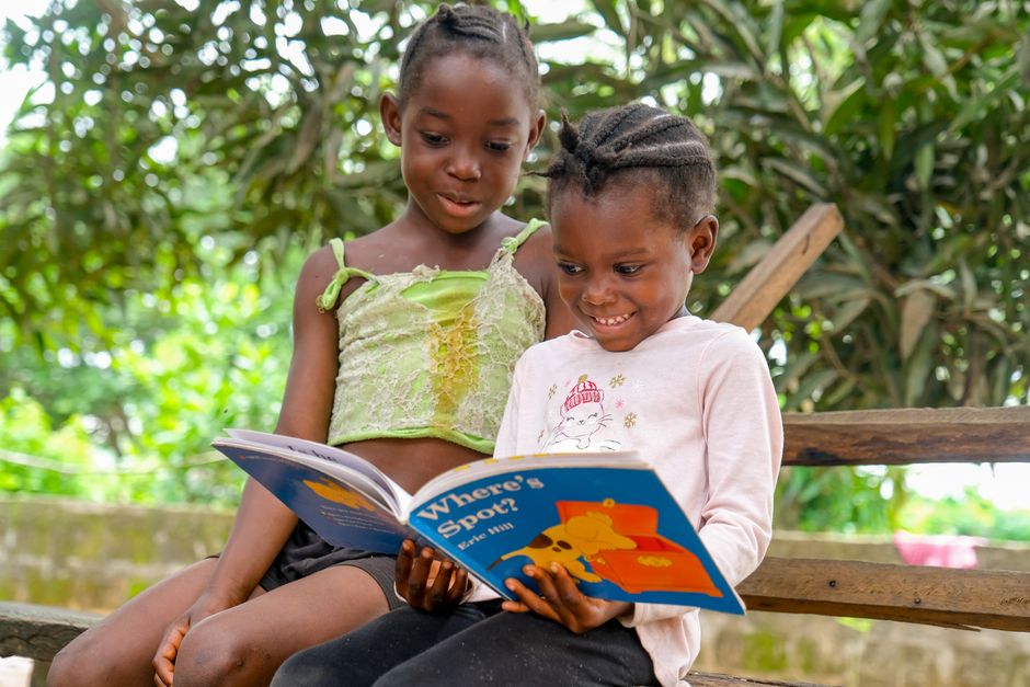 children reading books together