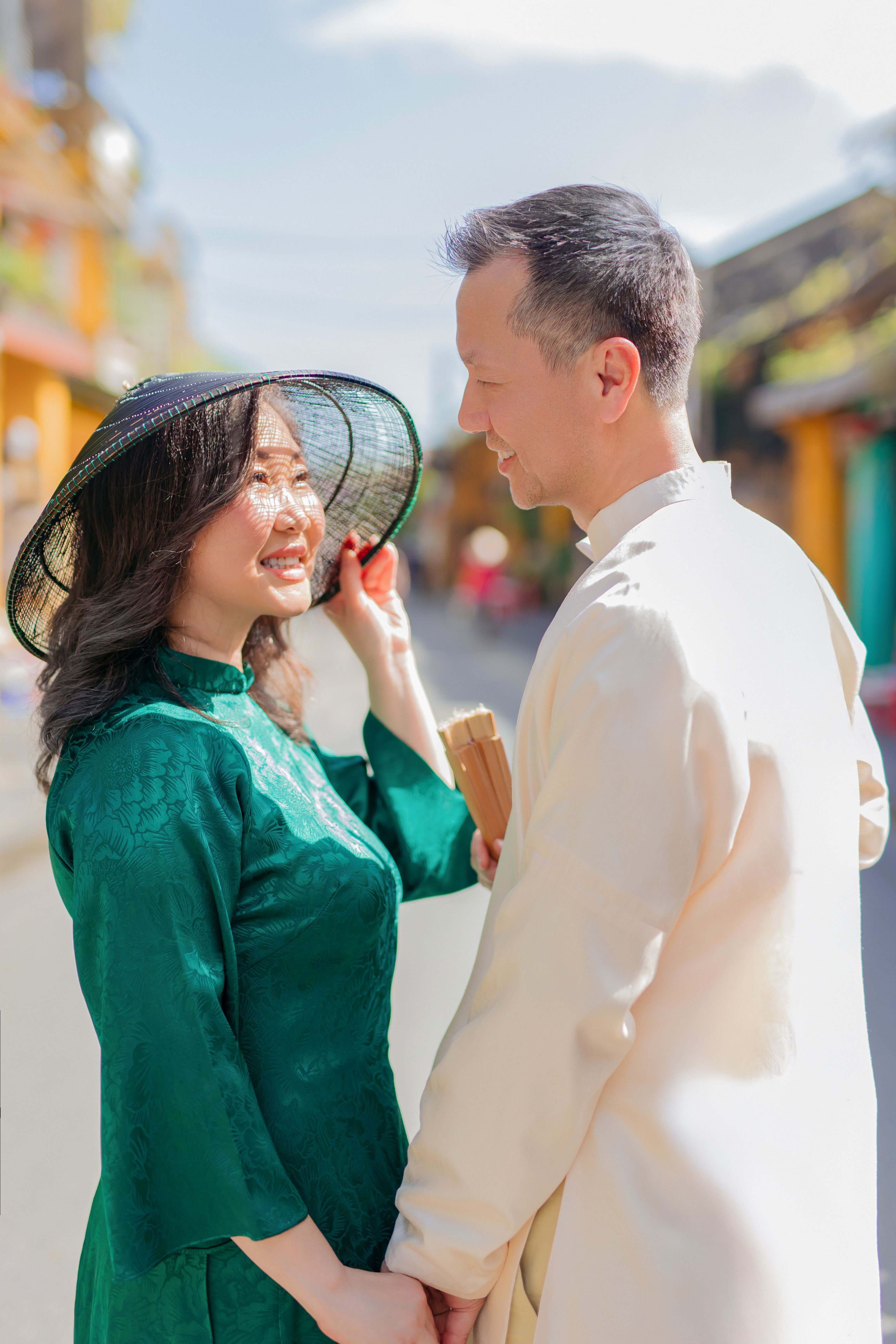 Romantic Couple in Traditional Attire Outdoors · Free Stock Photo