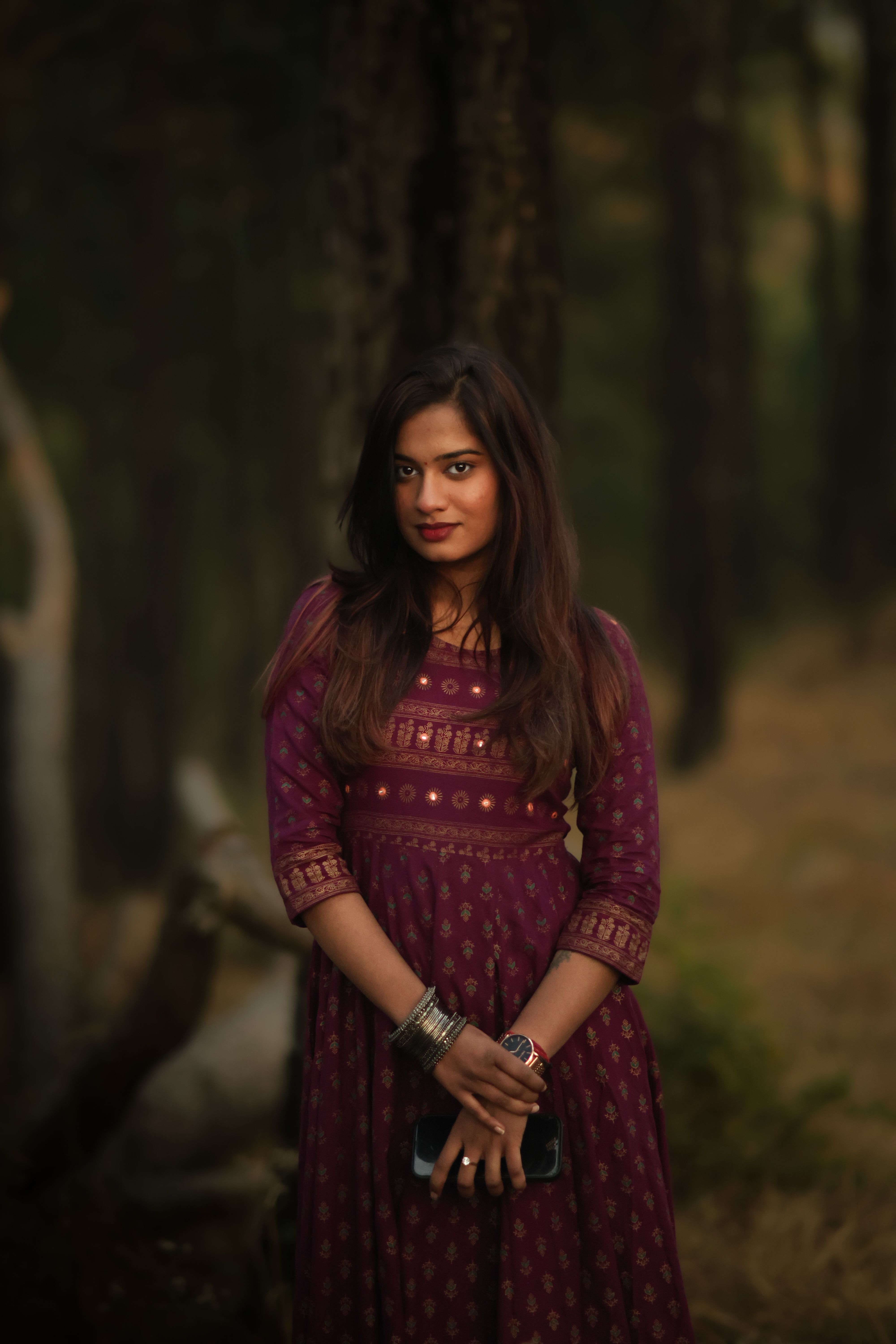 Portrait of Woman in Purple Dress in Forest Setting · Free Stock Photo