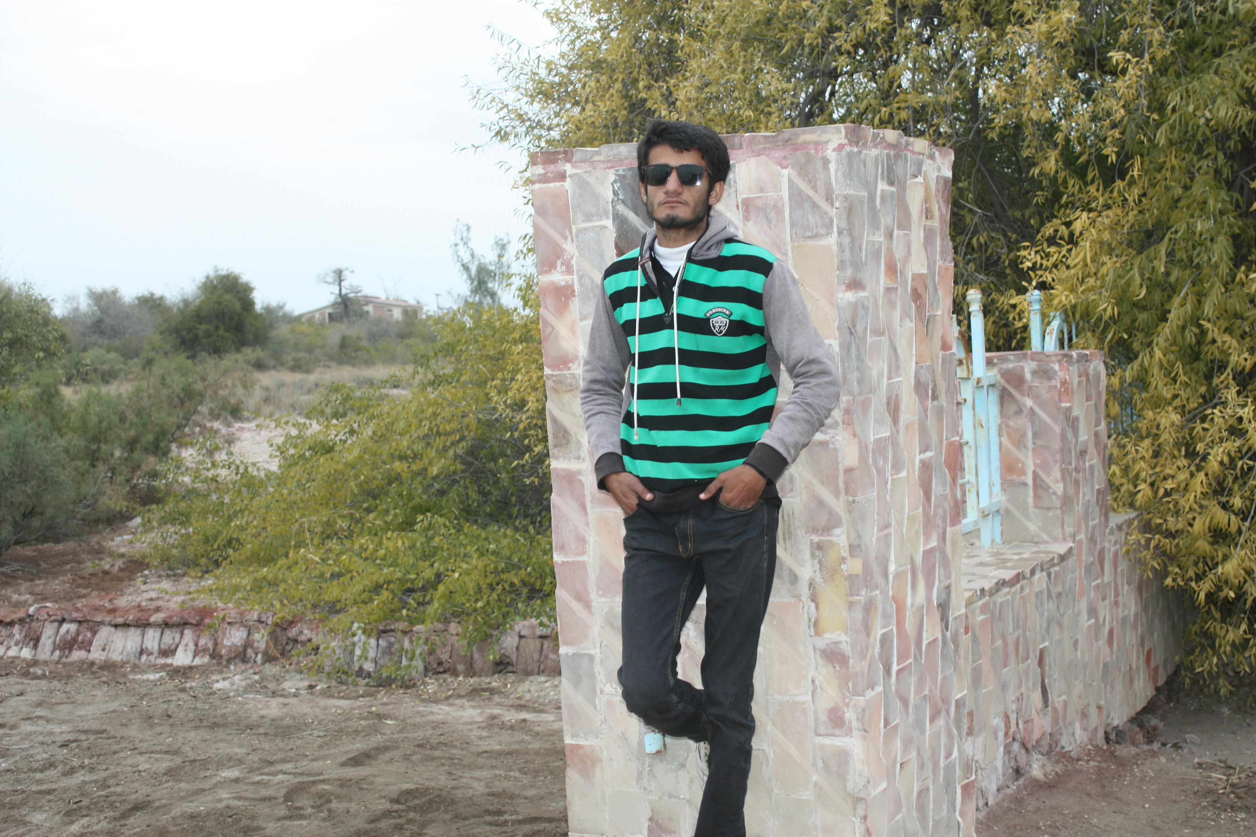 Two women wrestlers facing off in a ring under arena lights