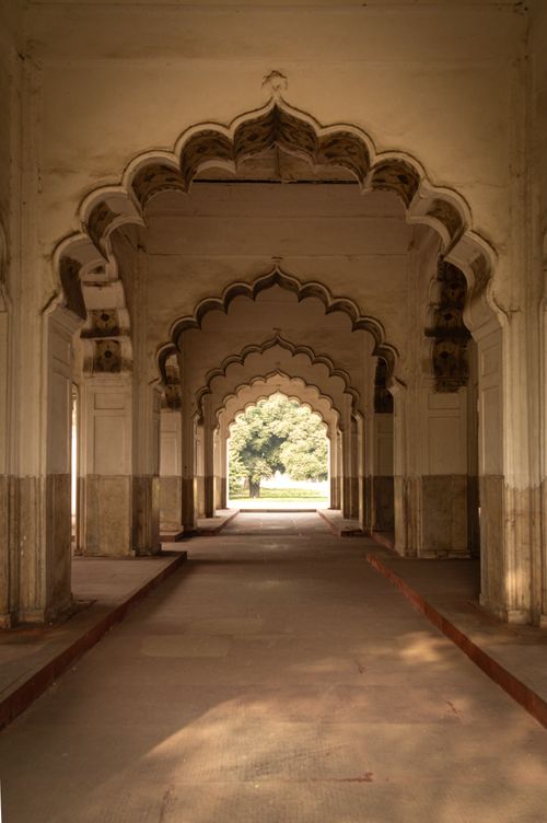 Free Stunning view of Mughal architecture with arched corridors and natural light. Stock Photo