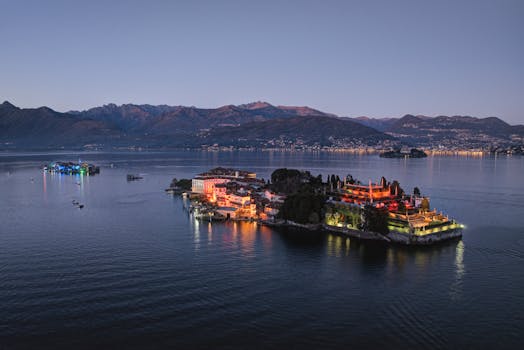 A breathtaking aerial shot of Lake Maggiore's islands illuminated at twilight, showcasing picturesque landscapes.
