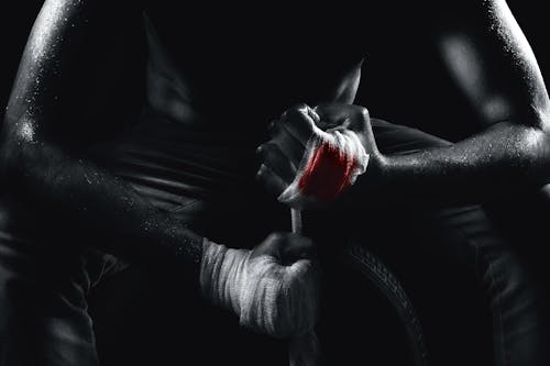 Free stock photo of black background, fight, hand