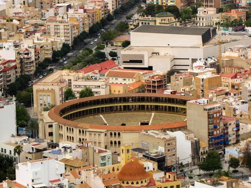 Free A picturesque aerial view of Alicante's iconic bullring surrounded by urban architecture. Stock Photo