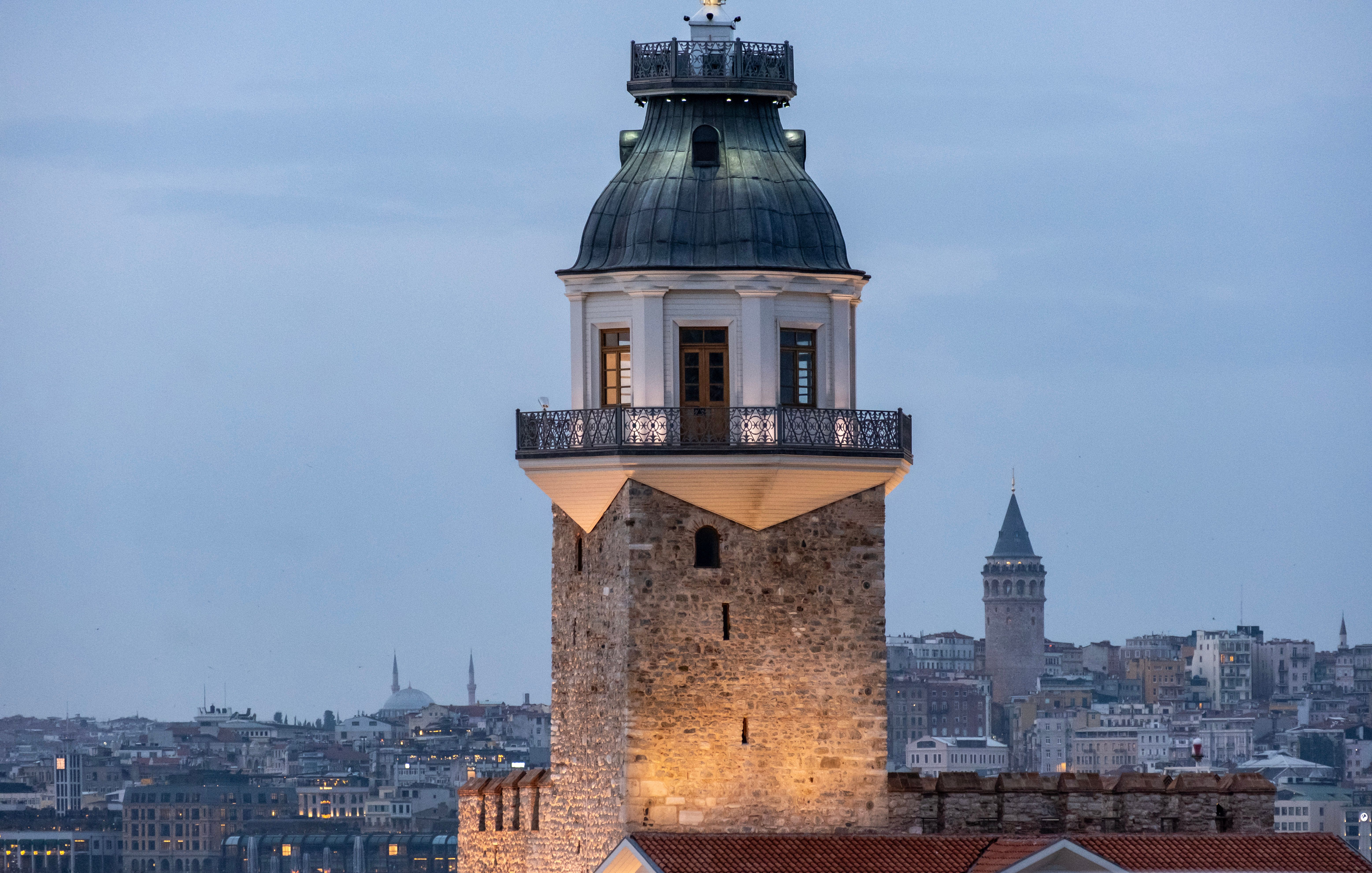 Maiden's Tower with Galata Tower in Istanbul skyline · Free Stock Photo