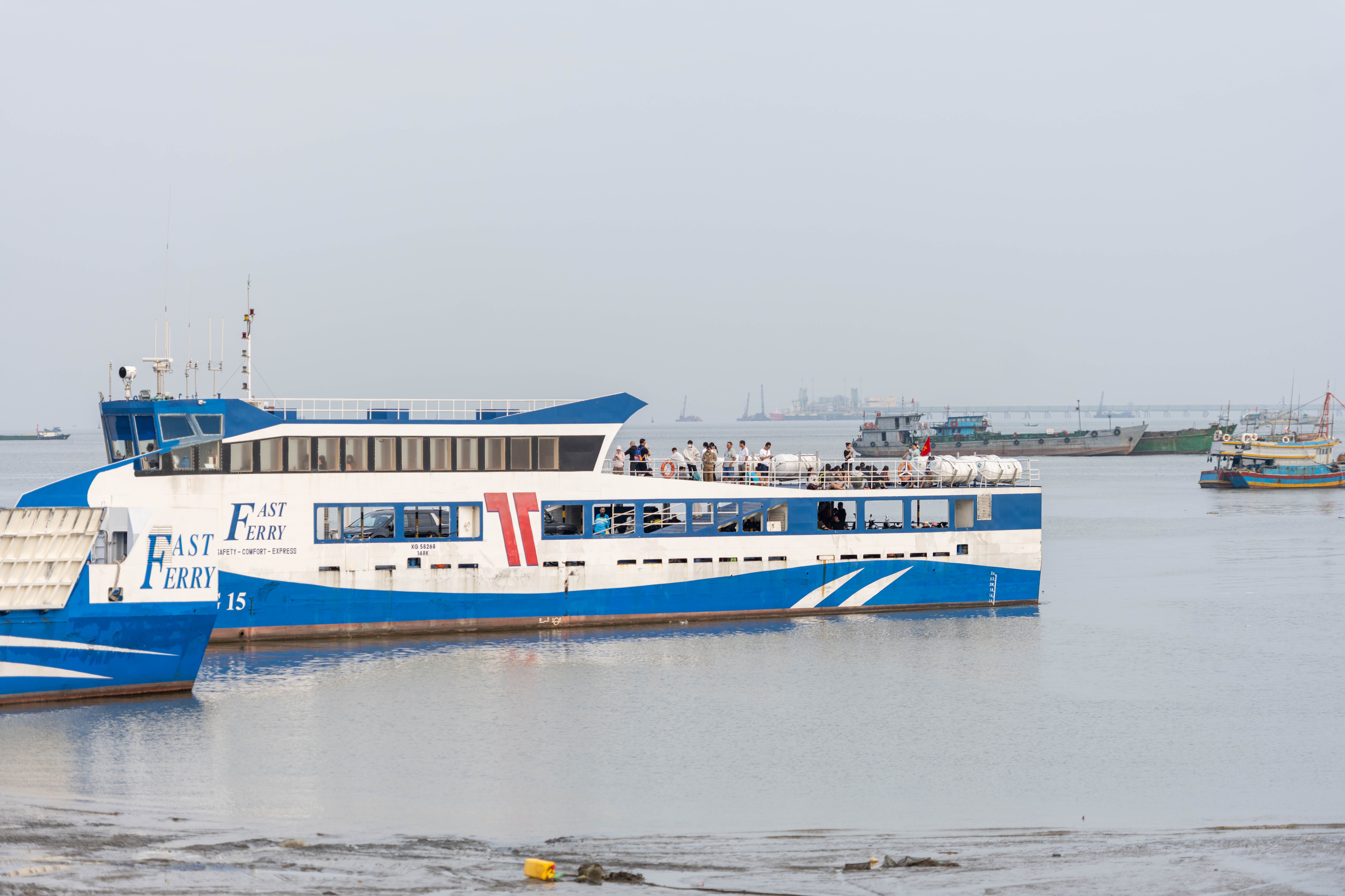 The Payslip Is in Singapore Dollars. The Ferry, the Dorm, and the Exchange Booth Take Their Cut First. post image