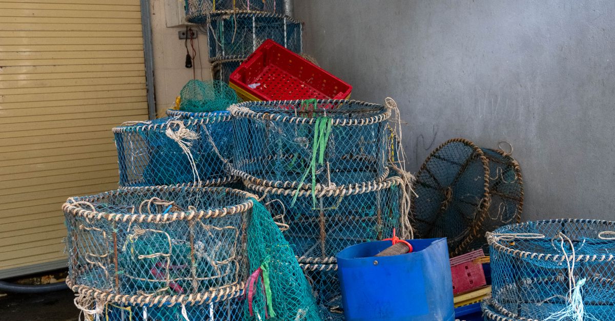 Vibrant fishing baskets stacked in a Vũng Tàu market, Vietnam.