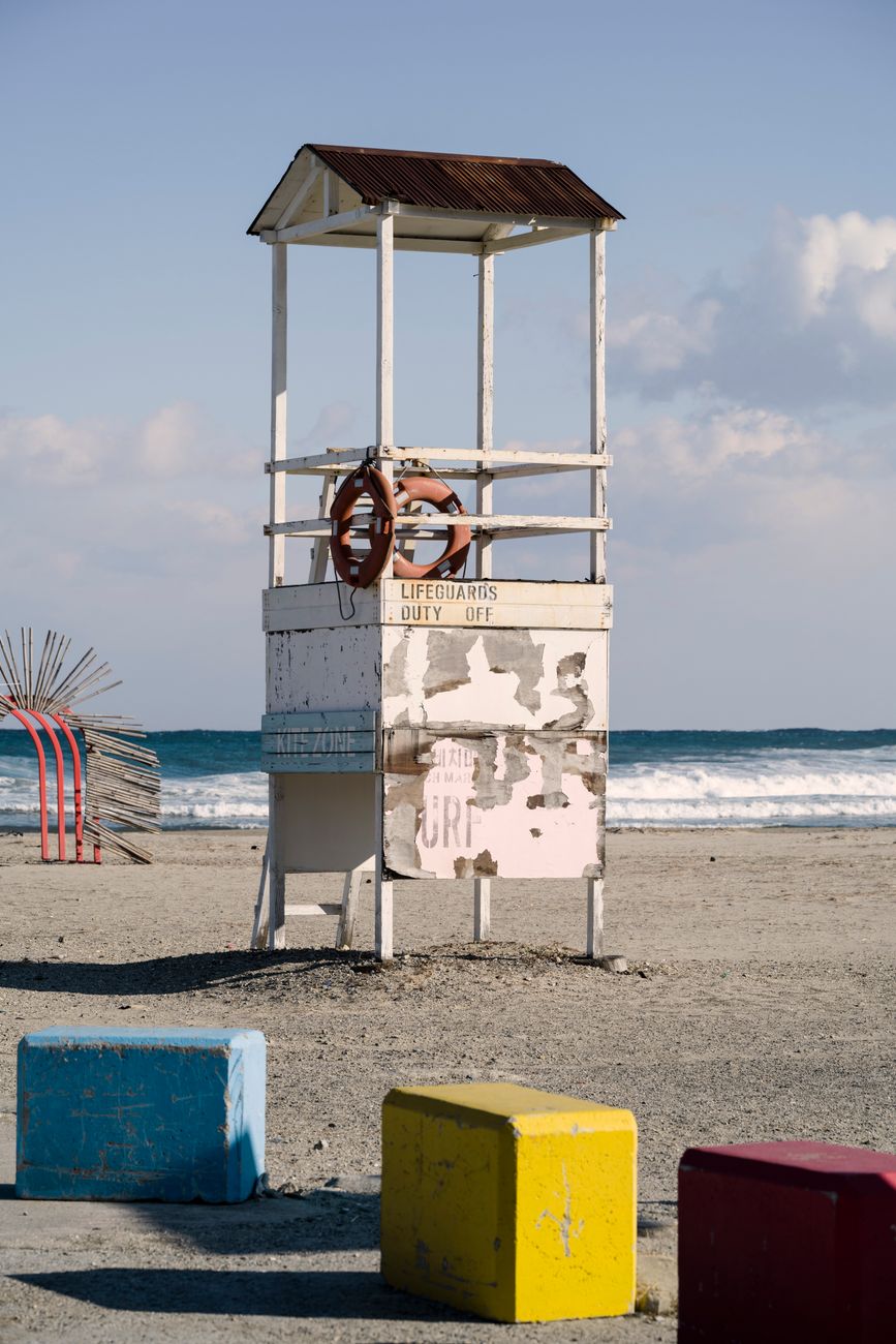 Traditional lifeguard towers offer limited elevation and field of view compared to the new drone surveillance system now in use.