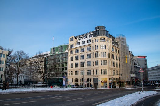Urban landscape of Hamburg's historic architecture during a snowy winter day.