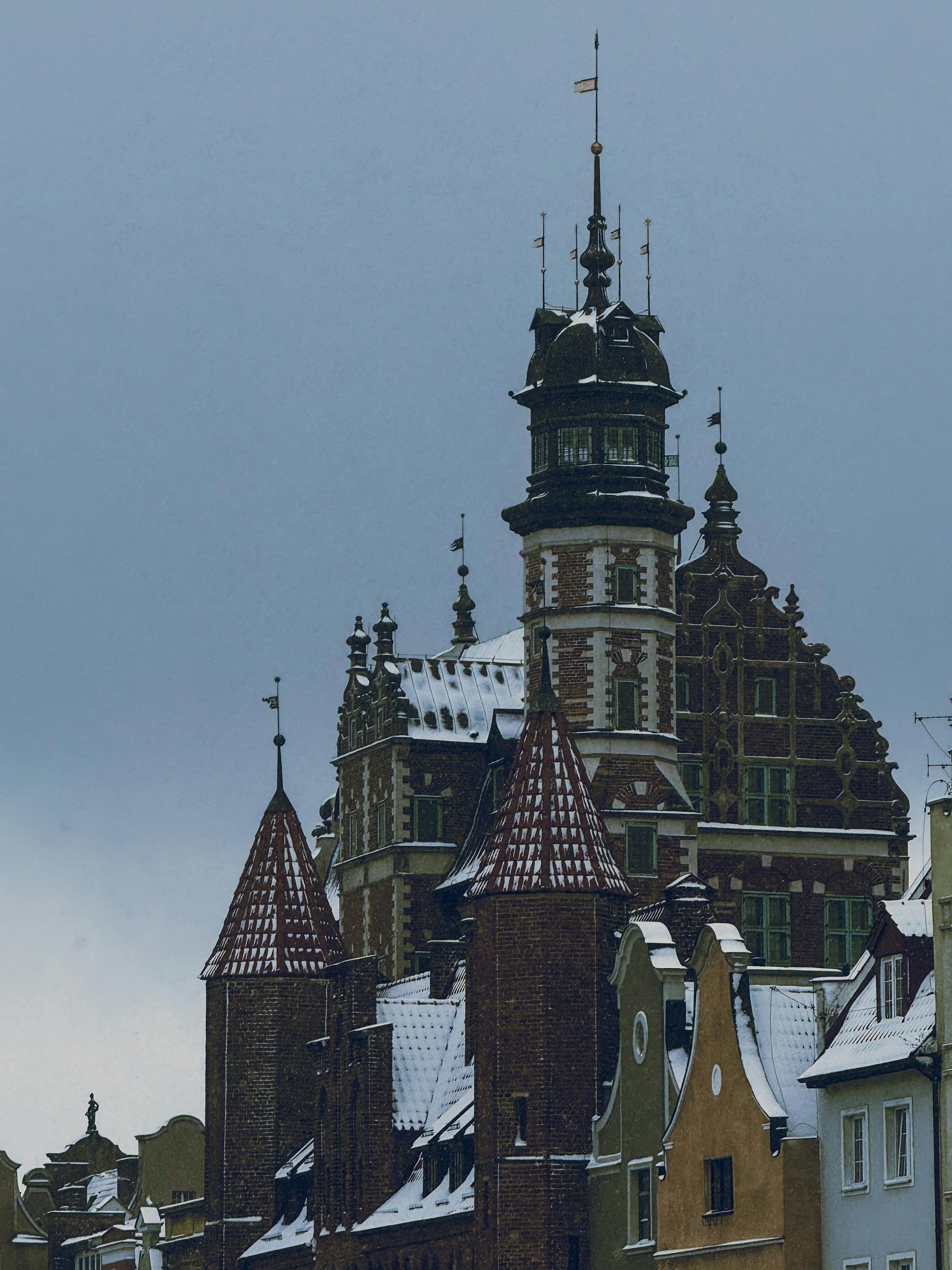 Snow-covered historic architecture showcases European winter charm.