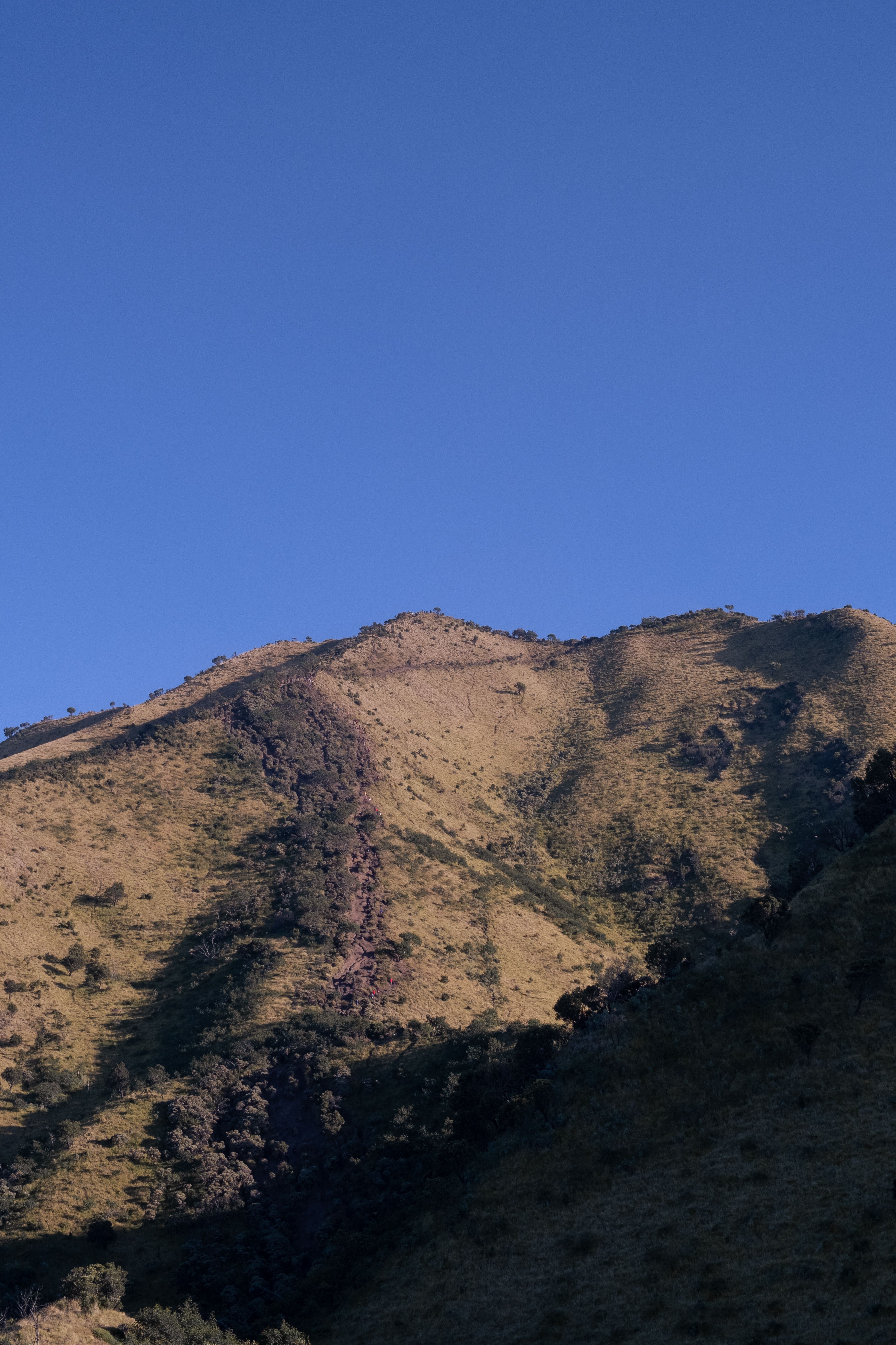 Majestic Mountain Peak Under Clear Blue Sky · Free Stock Photo