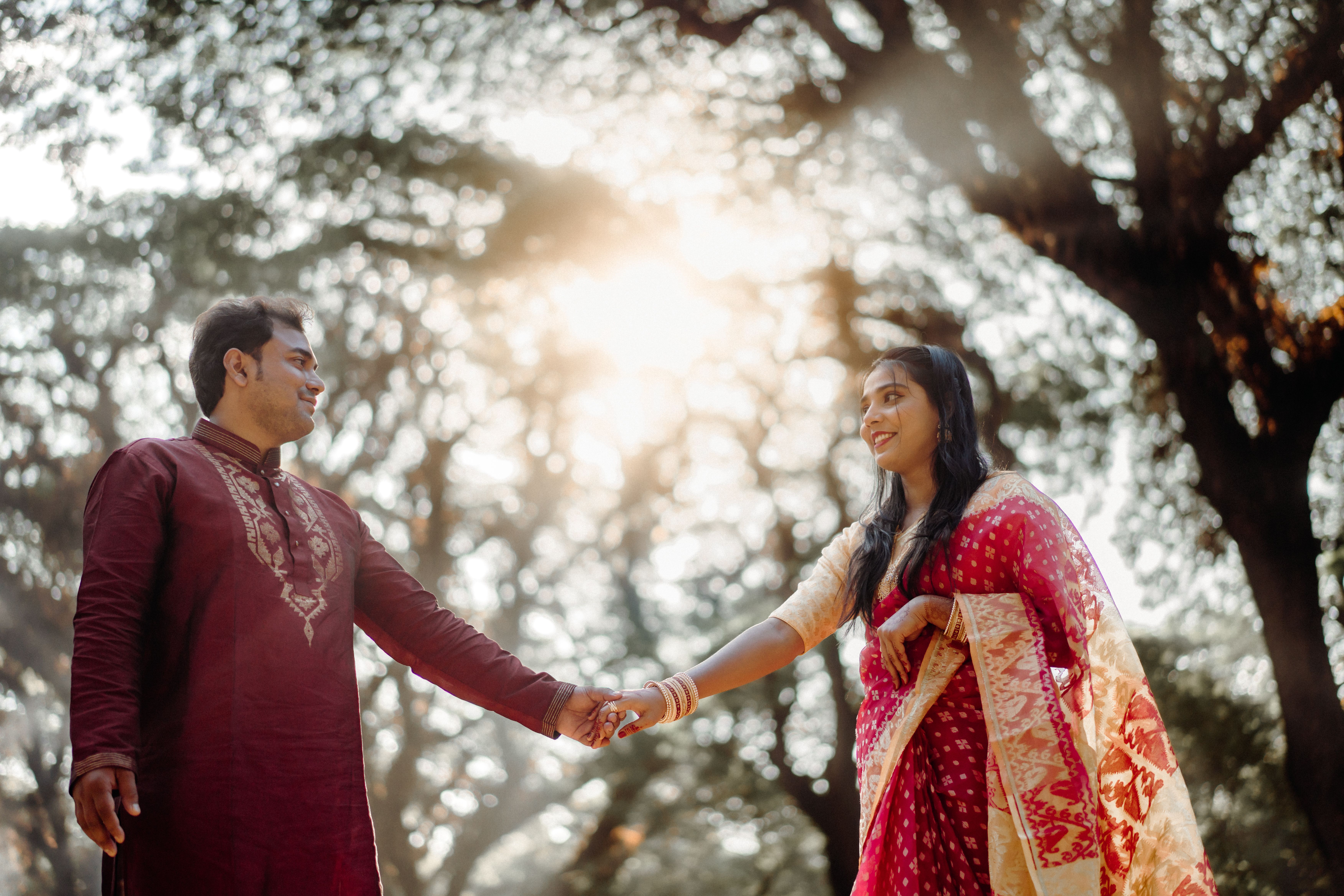 Romantic Couple in Traditional Attire Outdoors · Free Stock Photo