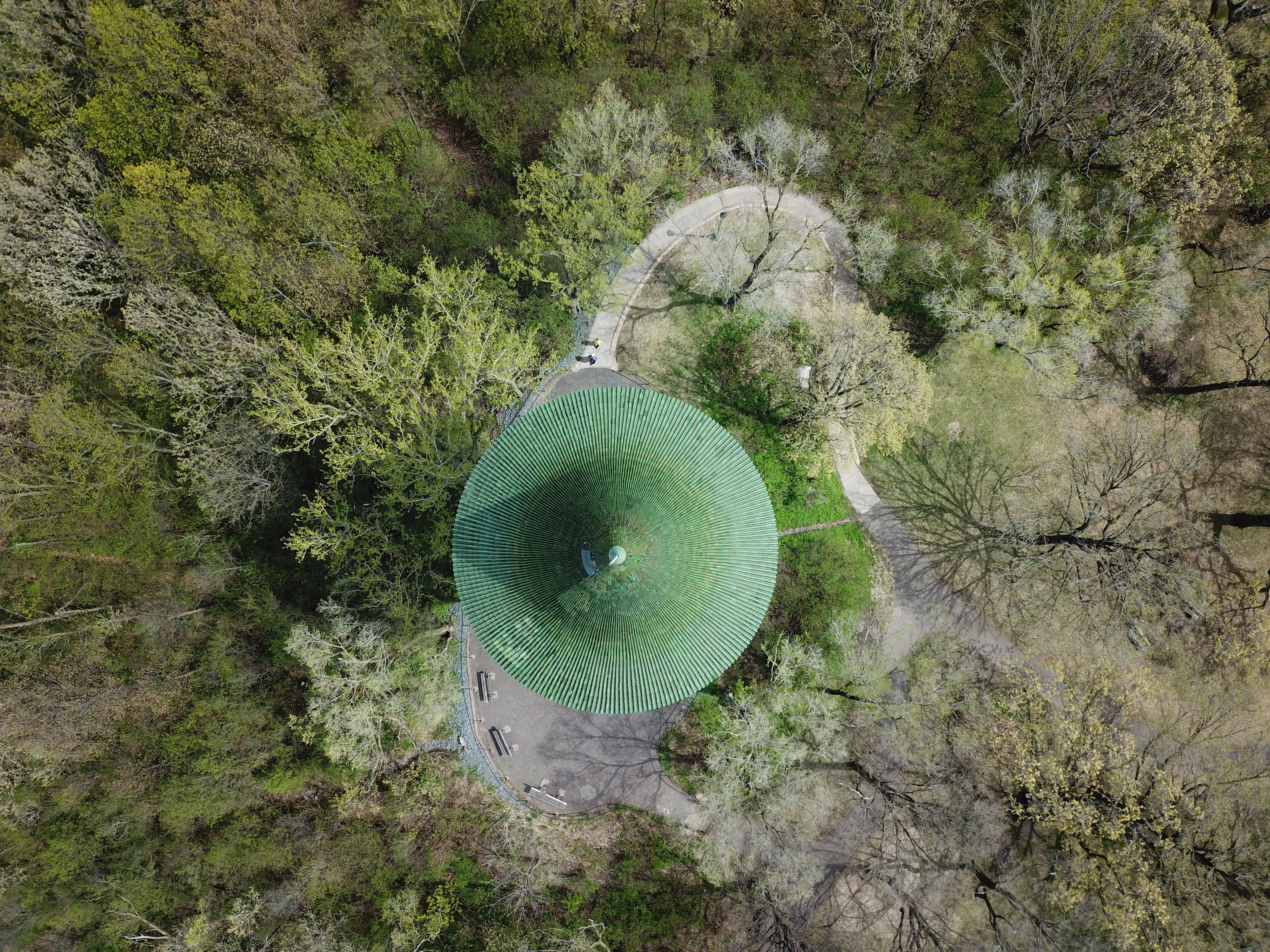 Aerial view of the Witch's Hat Tower surrounded by lush greenery in Minneapolis.