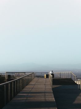 A serene view from a wooden overlook in Agadir, Morocco. Perfect for nature and travel enthusiasts.
