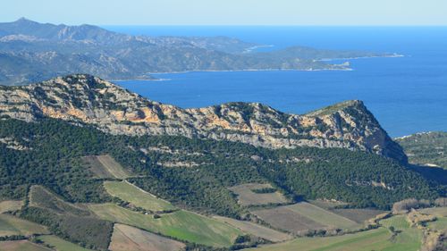 Free A breathtaking view of mountains and coastline in Saint-Florent, Corsica, France. Stock Photo