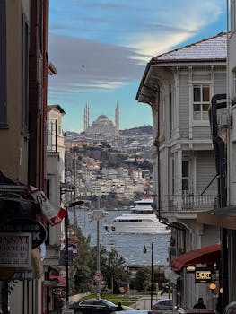 A breathtaking view of Büyük Çamlıca Mosque from Arnavutköy in Istanbul, Turkey featuring coastal scenery.