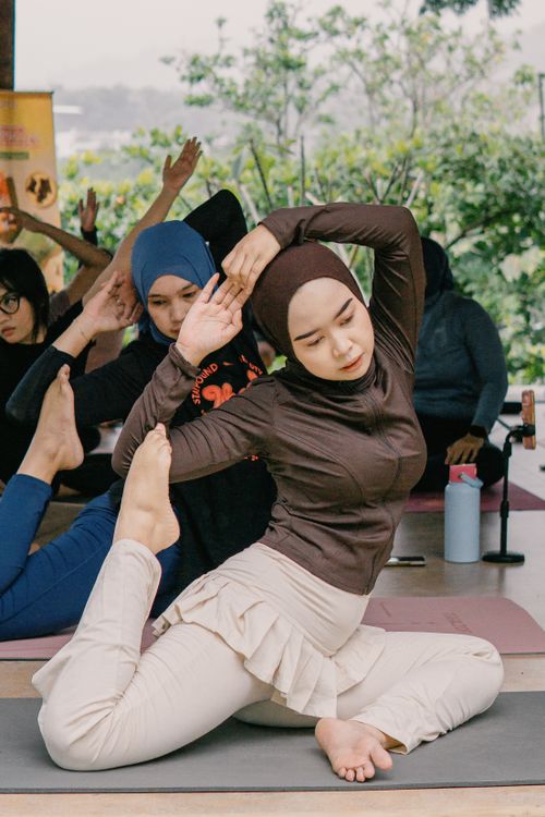 Free A diverse group practicing outdoor yoga in Jawa Barat, Indonesia. Stock Photo