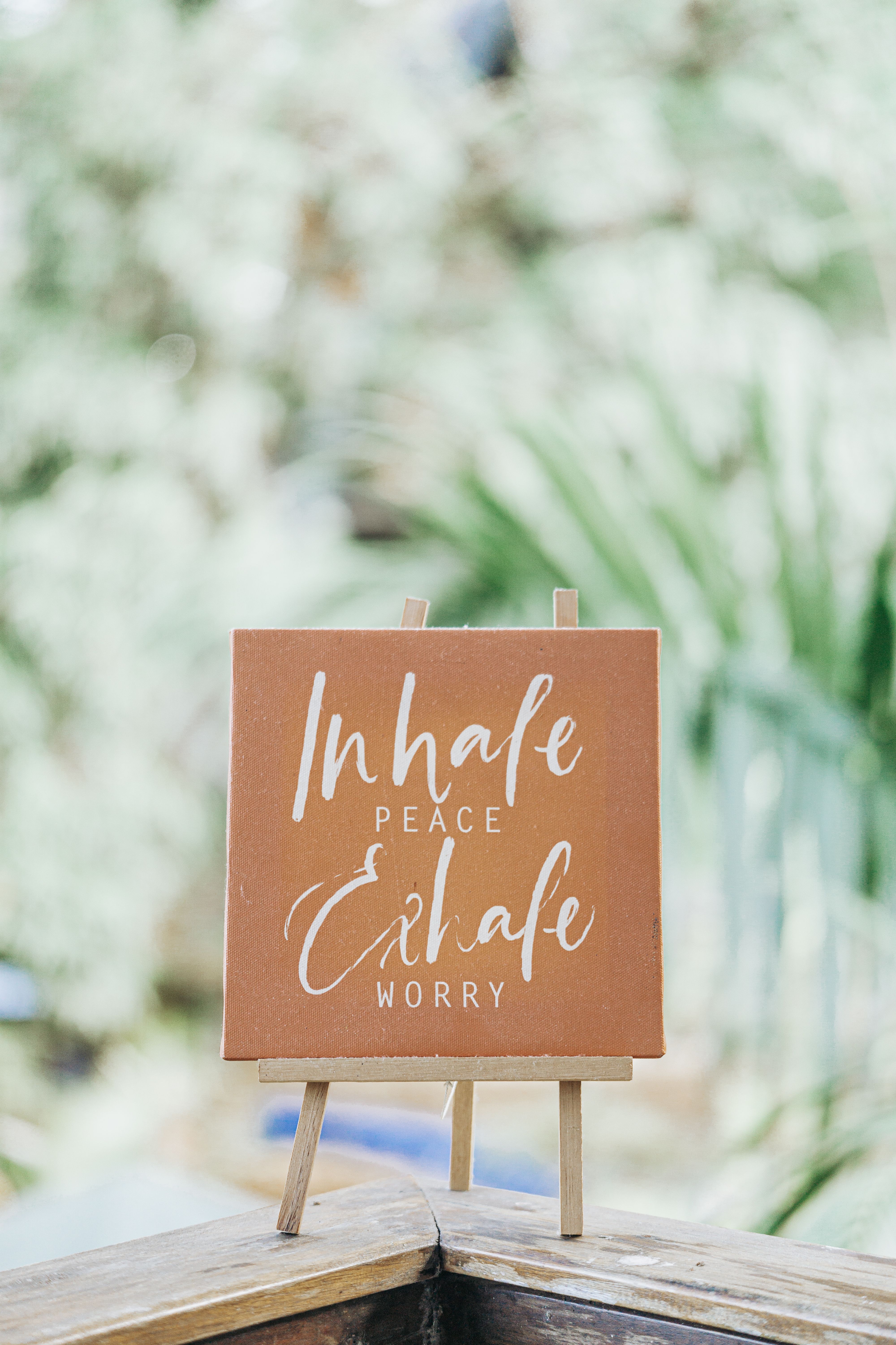 Inspirational Sign with Relaxing Message Outdoors · Free Stock Photo