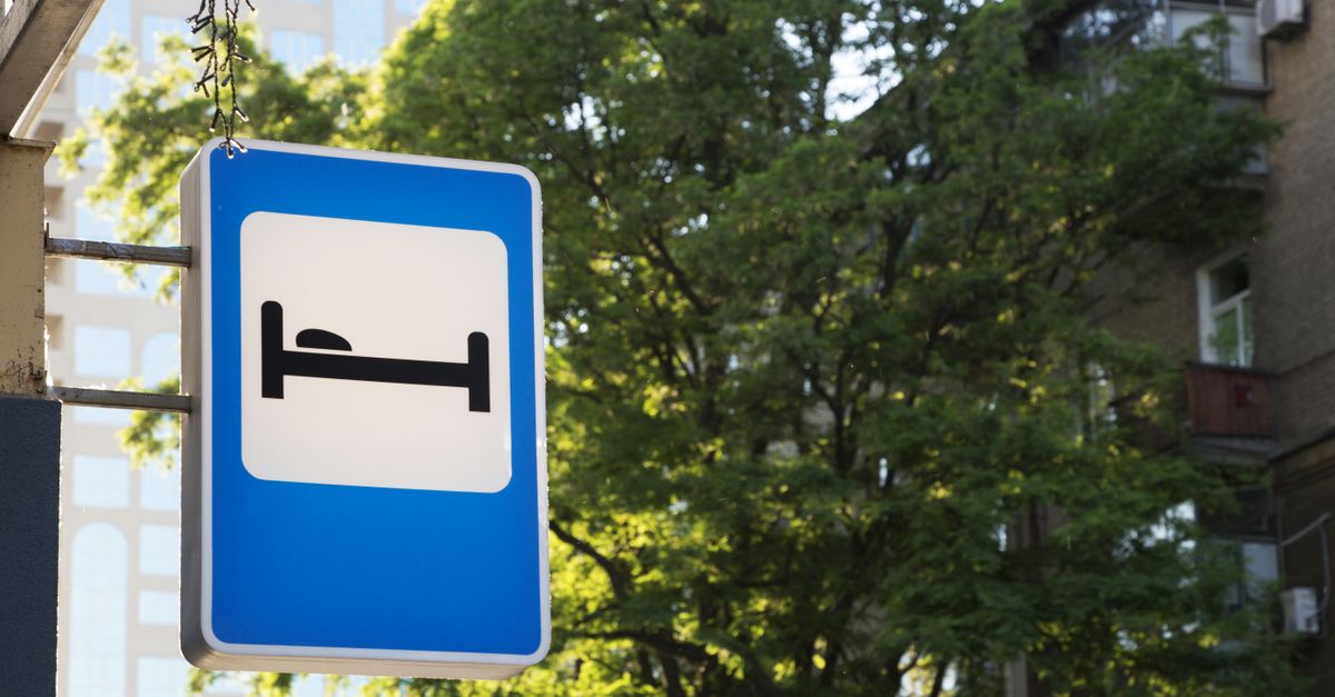 For sale sign outside a Toronto condo as falling rents pressure condo prices in the market