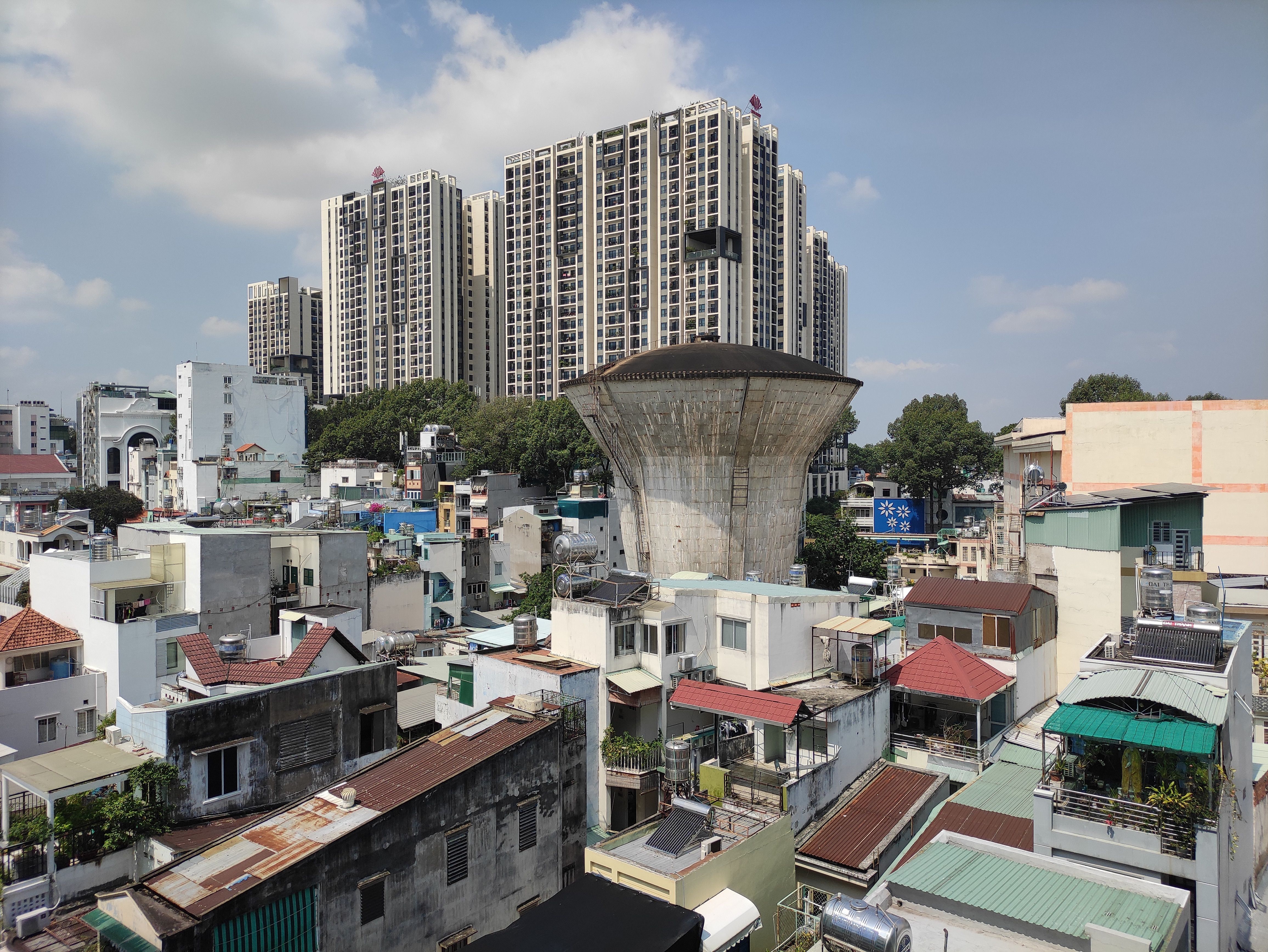 Photo inspiration: Fresh Look at Urban Skyline With Water Tower And High Rises