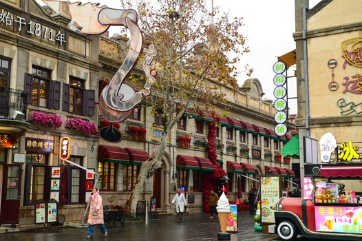 Yantai street view showcasing European-style architecture on a cloudy day.