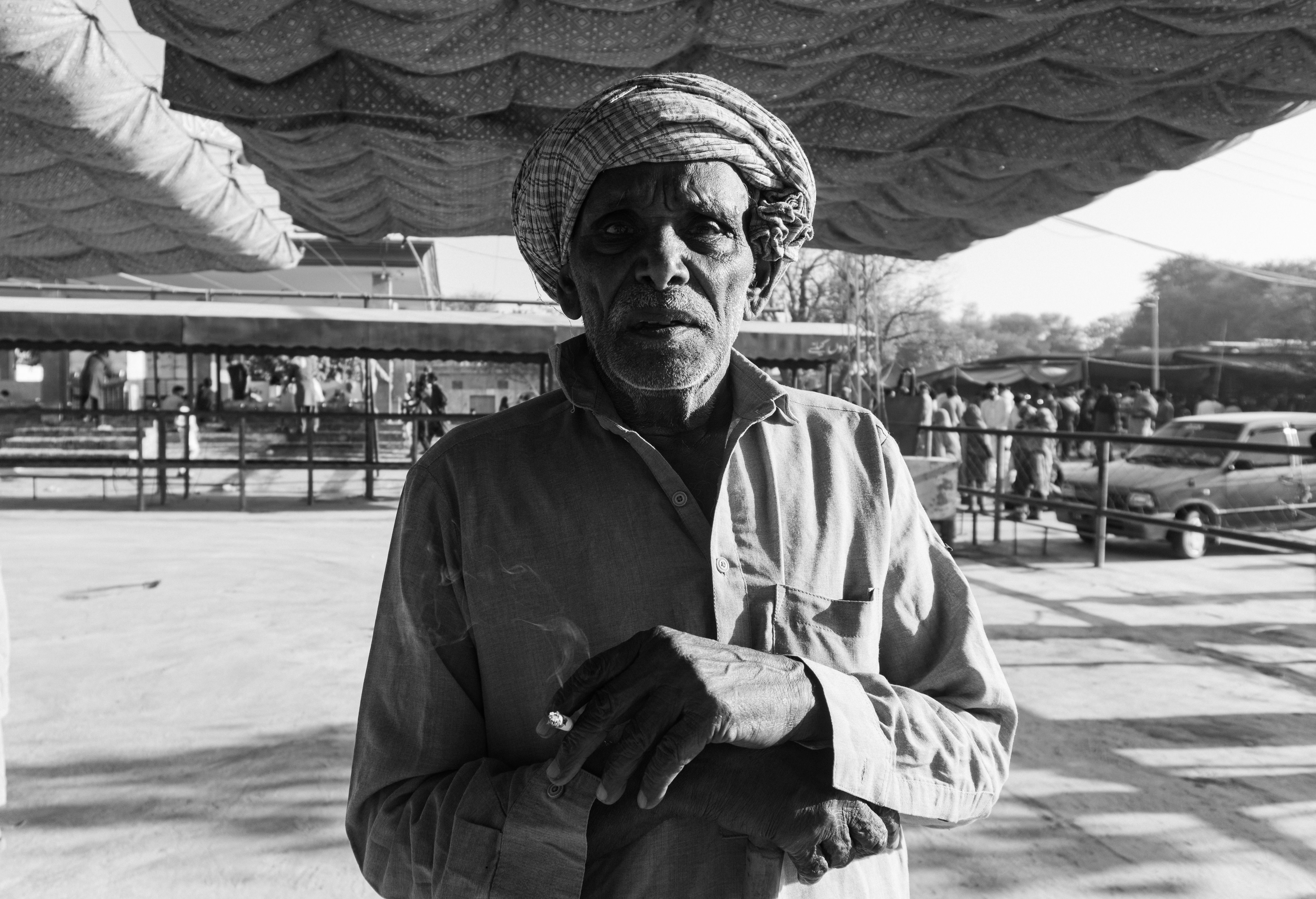 Portrait of Man in Traditional Attire Outdoors · Free Stock Photo