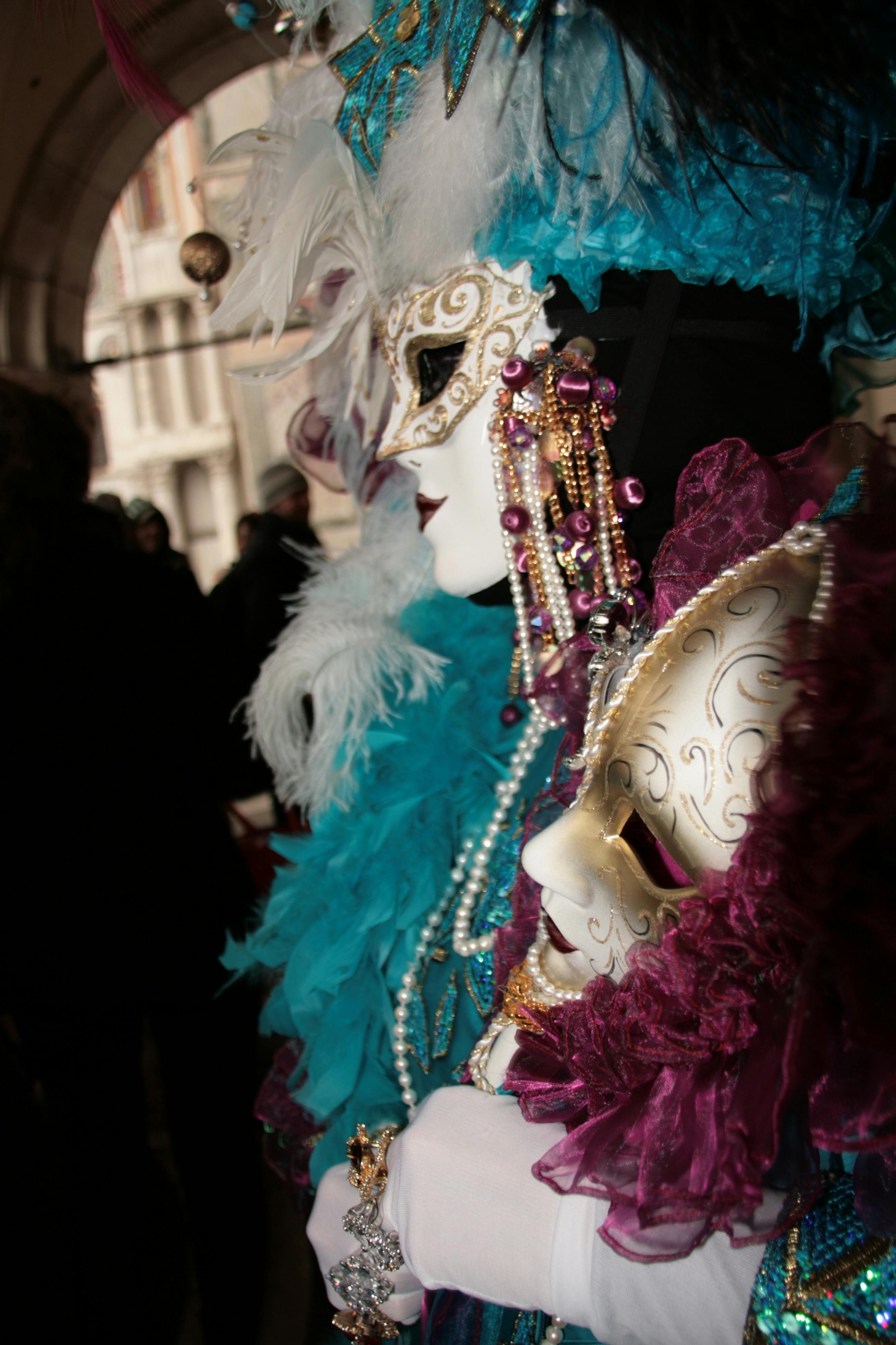 Venetian Carnival Masked Figure with Heart Motifs · Free Stock Photo